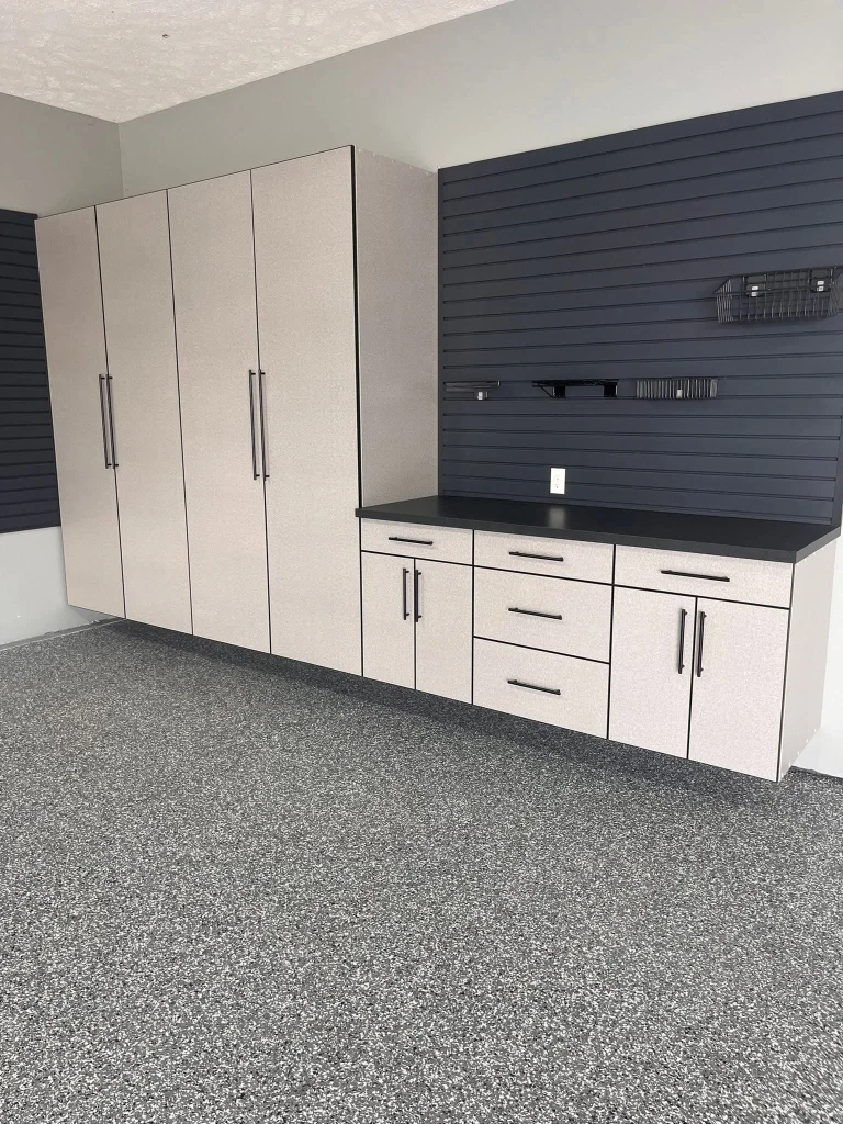 A sleek wall organization system highlighting an alternative to Utilizing Over Garage Door Storage