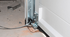 how to reattach garage door cable
