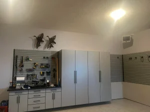 A professional home workshop setup featuring Garage Workbench Ideas