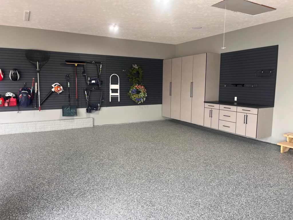 A clean and functional garage renovation featuring a Personalized Garage Workbench