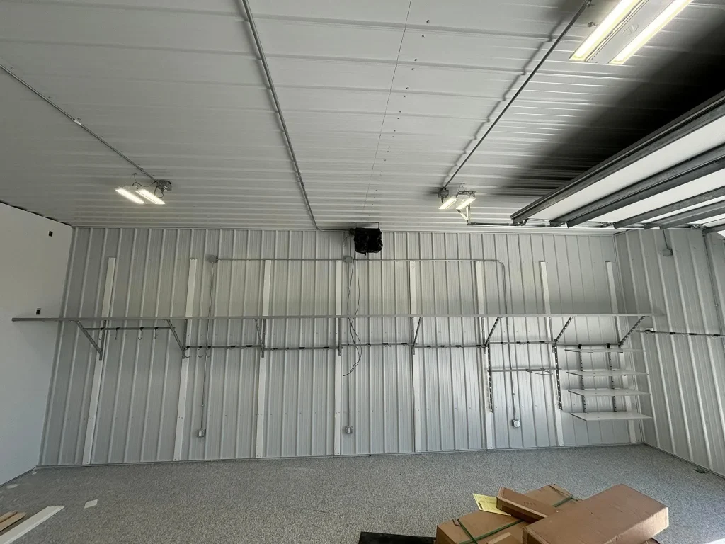 A high-ceilinged workshop showcasing how to utilize Hidden Space in Your Omaha Garage